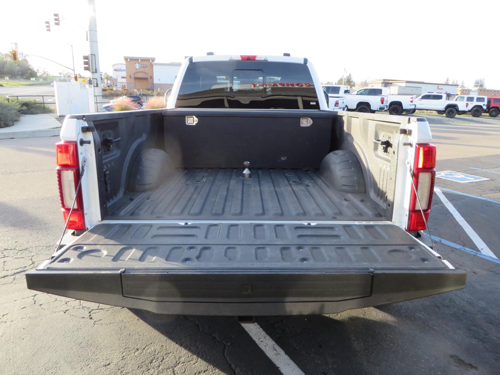 2020 White /BLACK Ford F-450 SD PlatinumCrew Cab DRW 4WD (1FT8W4DT4LE) with an 6.7L V8 OHV 16V DIESEL engine, 6A transmission, located at 2630 Grass Valley Highway, Auburn, CA, 95603, (530) 508-5100, 38.937893, -121.095482 - Must see F450 with a tool box refueling station, window tint, and a center console vault. - Photo #9